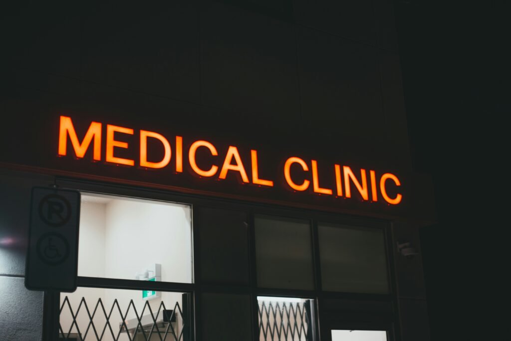 Doctor reviewing medical billing software with patient data on screen, highlighting strategies for patient retention and revenue cycle management.