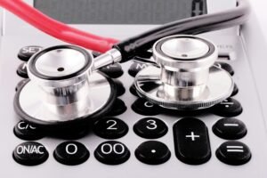 Healthcare professional using automated insurance eligibility verification system to streamline medical billing process